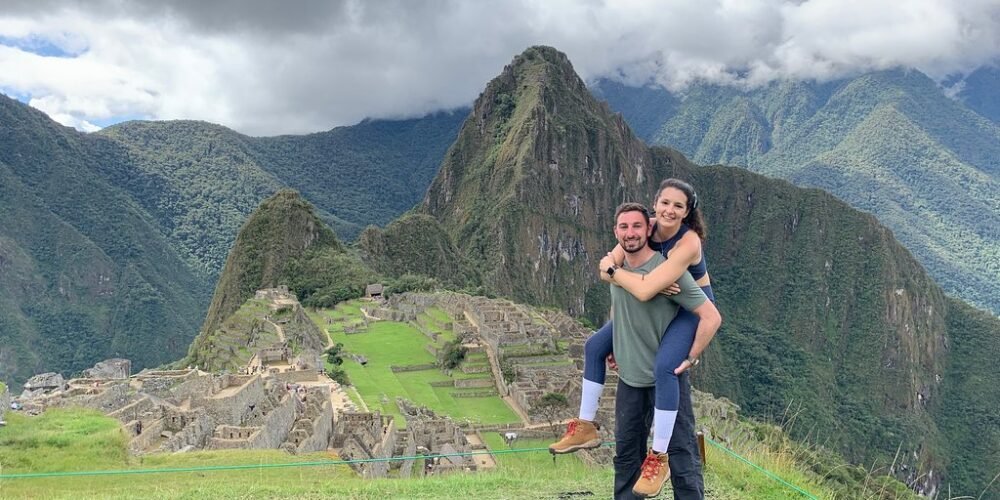 a happy couple in Machu Picchu